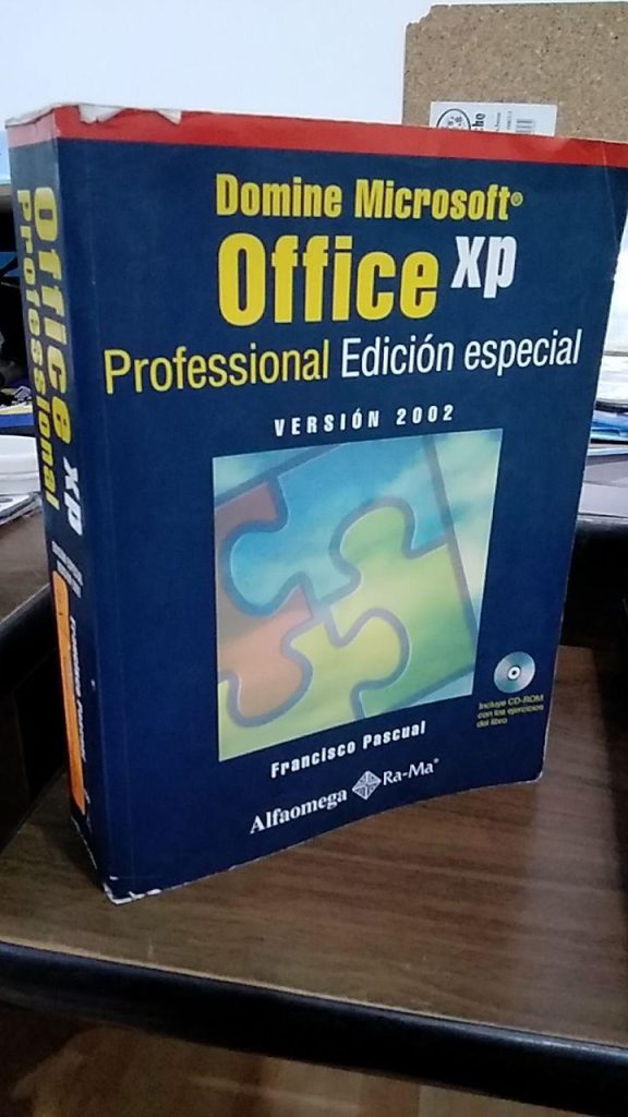 person comparing a Microsoft Office 365 product key list warning on a laptop screen