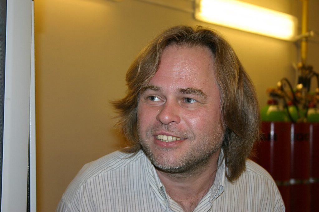 person checking a laptop for a free kaspersky activation code