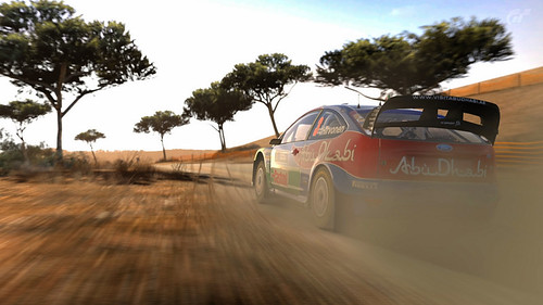 PlayStation Store promo codes and voucher redemption on a controller and console screen