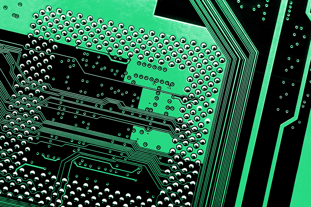 Game controller next to a PC with a cyber security shield icon